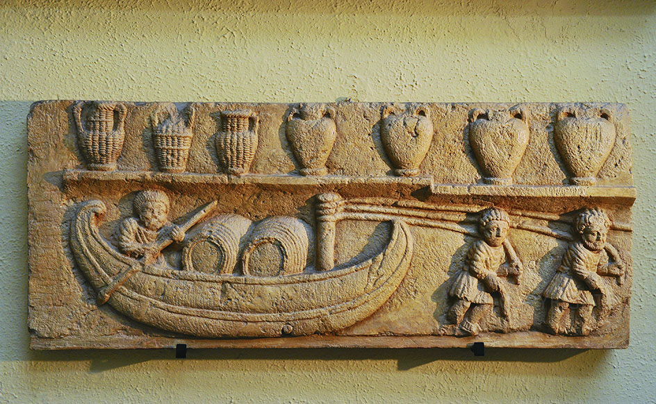 Bas-relief with barge transporting barrels
